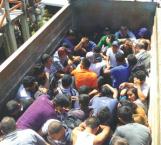 Rescatan 124 migrantes hacinados en camiones