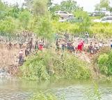 ´Ahora o nunca´, migrantes desesperados cruzan el río